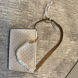 Brand new Michael kors waist bag size small